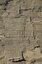 Old, sloppy, multi-layered wall covering of the house. Rough, uneven surface. Cement plaster on a brick wall Royalty Free Stock Photo