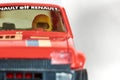 Old slot car of the Spanish brand Scalextric, replica model of a red Renault 5 decorated with the French flag