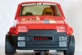 Old slot car of the Spanish brand Scalextric, replica model of a red Renault 5 decorated with the French flag