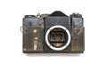 Old SLR camera rusted from falling into the water, on a white isolated background Royalty Free Stock Photo