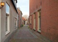 Old and small alley in the center of Schipluiden, the Netherlands