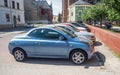 Old small blue city compact car Nissan Micra convertible