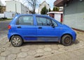 Old small blue compact car Daewoo Matiz private car parked Royalty Free Stock Photo