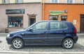 Old small dark blue city compact car Volkswagen Polo