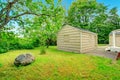 Old small fixer-upper house. Backyard view