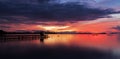 Old small jetty in to the sea in Long exposure image of dramatic Royalty Free Stock Photo