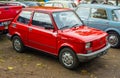 Old small red car Polski Fiat 126p parked front view Royalty Free Stock Photo