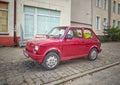 Old small red car Polski Fiat 126p parked Royalty Free Stock Photo