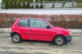 Old small red simple popular veteran compact car Volkswagen Lupo parked Royalty Free Stock Photo