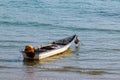 Old small rusty fishing boat anchored Royalty Free Stock Photo