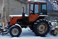 An old small snow removal tractor. Royalty Free Stock Photo