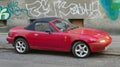 Old small sport car Mazda MX-5 coupe parked