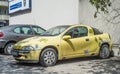 Old small sport compact car yellow Opel Tigra parked Royalty Free Stock Photo