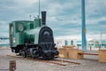 Old small steam locomotive on a display at the port in Reykjavik, as a memory of once part of only train line in Iceland Royalty Free Stock Photo