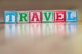 Small toy wooden blocks spelling word travel Royalty Free Stock Photo