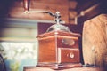 Old small vintage mechanical coffee grinder Royalty Free Stock Photo