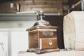 Old small vintage mechanical coffee grinder Royalty Free Stock Photo