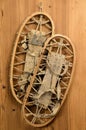 Old Snow Rackets on Wood Wall in a Mountain Cabin