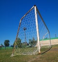 Old soccer goal on a rural football pitch Royalty Free Stock Photo