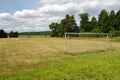 Old soccer goal on the village sports field Royalty Free Stock Photo