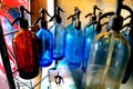 Old soda water bottles in an antique shop