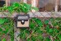 Old solar light lamp hank on fence Royalty Free Stock Photo