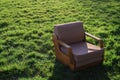 Old soviet armchair outside on the lawn. Royalty Free Stock Photo