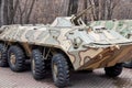 old Soviet armored personnel carrier in camouflage paint