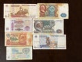 Old Soviet banknotes in denominations of three, five, twenty-five, fifty, one hundred rubles on a dark background Royalty Free Stock Photo