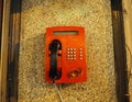 Old soviet broken street telephone with a rusty slot for coins and shabby metal number buttons Royalty Free Stock Photo