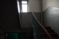 Old soviet dirty dark staircase in an apartment building in dnipro city