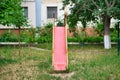 Old soviet era red metal slide on a playground Royalty Free Stock Photo