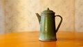 Old soviet green metal kettle.