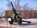 An old Soviet howitzer as military monument. Winter shooting