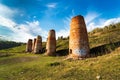 Old soviet lime kilns under a cloudy sky on a summer day