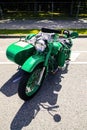 Old Soviet motorcycle URAL with a stroller Royalty Free Stock Photo