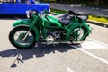 Old Soviet motorcycle URAL with a stroller Royalty Free Stock Photo