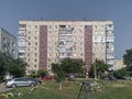 Old Soviet prefabricated nine-storey panel apartment building with two entrances