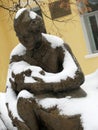 An old Soviet Statue of a female soldier is covered in winter snow - BACK IN THE USSR