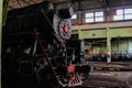 Old Soviet steam locomotive at the train depot