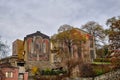 Old soviet style houses with magnificent painting made of mosaics with autumn colors: