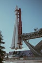 An old space rocket stands on a pedestal Royalty Free Stock Photo