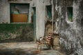 Old Spanish weathered front door and garden