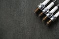 Old spark plugs on the black table Royalty Free Stock Photo