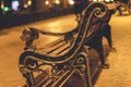 Old but special bench against the background of the beautiful night Baku boulevard.
