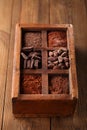 Old spicy box full of chocolate Royalty Free Stock Photo
