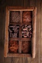 Old spicy box full of chocolate Royalty Free Stock Photo