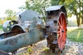 Old spiked red iron wheel from tractor Royalty Free Stock Photo