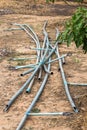 Old spinger and pvc pipe in farmland Royalty Free Stock Photo