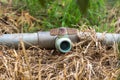 Old spinger and pvc pipe in farmland Royalty Free Stock Photo
